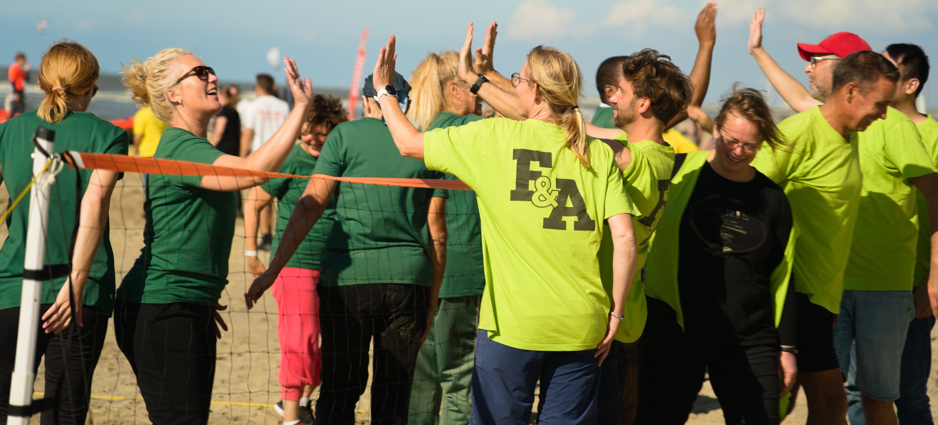 Teva Harlem employees highfiving after a match