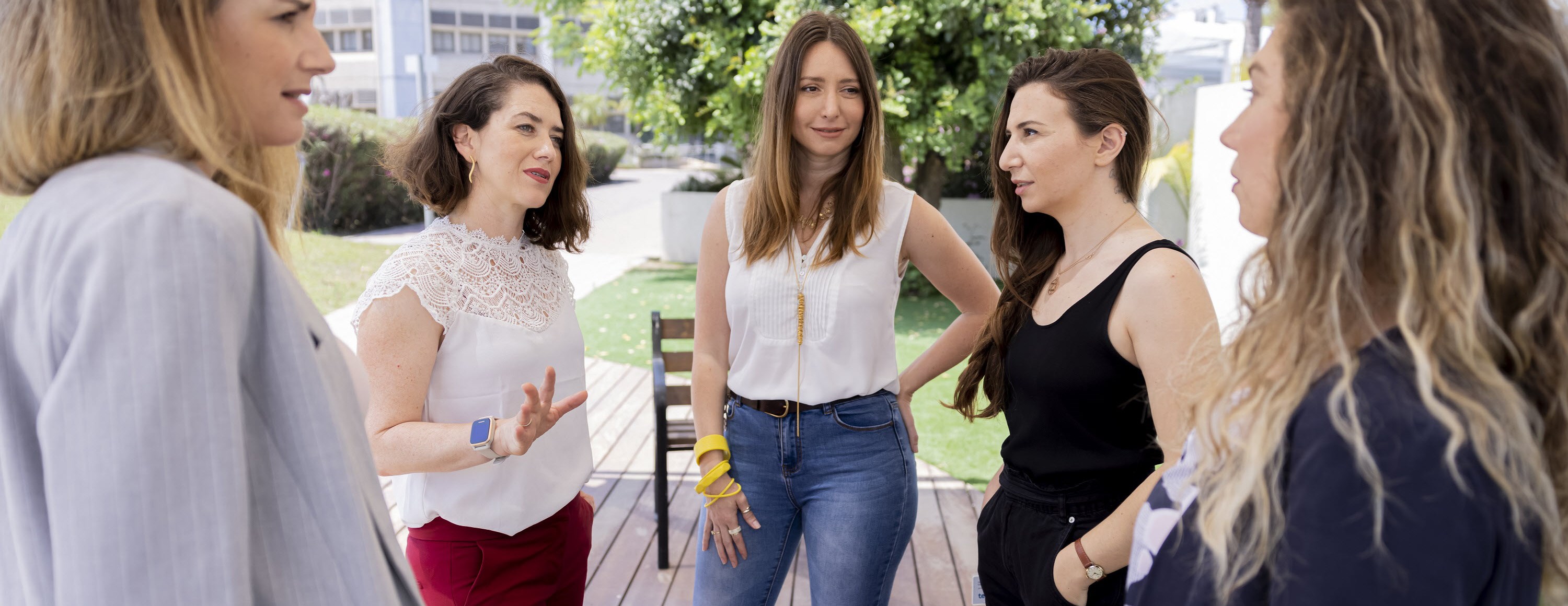 Teva female employees in a circle